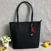 أكياس كبيرة 2022 New Canvas Nylon Women Women Bag Axford Butot Bags One One Counter Prace Handbag Myy M44495