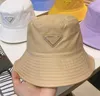 Designer Nylon Bucket Hat For Men and Women Fashion Ladies Mens Autumn Summer Triangle Metal Sun Hats New Spring Fisherman Caps DR2631338