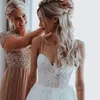 Neue Ankunft Spaghetti Perlen Tüll Hochzeit Kleider Appliques Empire Einfache Elegante Garten Hochzeit Sexy Backless Braut Ehe Kleid