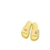 2022 Xiaoxiang vind tofflor kvinnors sommar tjocka botten ett ord tofflor sandaler bär färg godis bokstäver platt häl designer