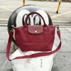 Kadın tasarımcı crossbody çanta logo kalınlaşmış naylon çanta bayanlar çok yönlü gündelik çantalar