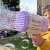 Bubble Gun Boom Blower Rocket 69 Holes Water Gun Toys Soap Machine Automatic With Light For Kids Outdoor Pomperos Day Gift4973695