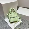 Bolsas com 70% de desconto Mini bolsa pequena feminina 2022 nova versão estampada mensageiro um ombro bolsas de mão