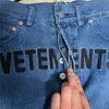 Jeans hommes femmes lettre brodées jeans jeans pantalon denim hétéro