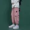 Herrbyxor svart last mode lösa tappade casual rosa hiphop sport japanska streetwear svettbyxor 220826