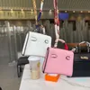 Luxurys Anahtar Vaka Çantaları Kanca Airpods Kılıflar Kulaklık Tasarımcı Çanta Askı Aksesuarları Mini Satchel Debriyaj Çantası Kadın Çanta Kompozit Lady Omuz Tote