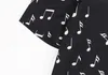 Camicie con motivo a note di pianoforte in bianco e nero per uomo Camicia casual a maniche corte di alta qualità Camicie eleganti da lavoro con streetwear sociale