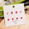 Stud doux belle rouge métal amour fleur boucles d'oreilles ensemble irrégulier Imitation perle creux arc pour les femmes cadeaux JewelryStud Kirs22