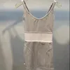 المرأة بلا أكمام فستان Bodycon ضمادة مثير مع رسالة زيبر Yogo ملابس اللياقة البدنية فساتين