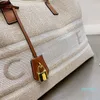 Diseñador - Bolso de compras a rayas Bolso de mano de lona Bolsos de cubo Letras bordadas Impresión de cuero Cerradura portátil Decoración Bolsos de gran capacidad Alta calidad