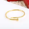 Nagelserie Gold Bangle Au 750 18 K Fade Alever 16 17 18 Storlek med Box Officiell replika Toppkvalitet Lyxvarumärke smycken Premium GI295O