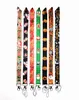 Fabrikpreis 100 Stücke All Saints 'Day Anime Lanyard Keychain Halsriemenschlüssel Kamera ID Telefon String Anhänger Abzeichen Party Geschenkzubehör Großhandel Großhandel