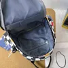Multifunktionell mini -kvinnors ryggsäck Spring Ny kontrastfärgplädet Liten axelväska Lämplig för Teenage Schoolgirls 220506