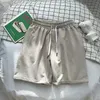 Partihandel män damer designer sommar snabb torr bad shorts mode lösa gatan sportkläder text mönster kläder badkläder byxor gudinna456