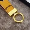 Designer nyckelringar män kvinnor bil nyckelkedjor keyring älskare nyckelring real läder klassisk mode hänge nyckelring tillbehör 03