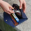Partihandel anpassad platsförsäljning av nya plånböcker Passtäckning Anpassade logotyp plånböcker