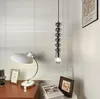 Lampada a sospensione dal design nordico Lampadario a soffitto a LED moderno nero singolo per sala da pranzo Bagno Camera da letto Appeso al comodino