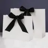 10 Pz/lotto Bianco Fiocco Nero di Alta Qualità Sacchetto Regalo Semplice Carta Kraft Contenitore di Caramella Con Maniglia Festa di Compleanno di Nozze 220427