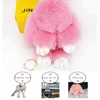 Porte-clés en peluche lapin mignon pompon, fausse fourrure artificielle 18CM, sac fait à la main, bijoux à la mode, cadeau de voiture, jouets pour enfants, femme AA220318