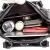 Moda de mochila de couro suave casual Moda para garotas Backpack de grande capacidade Designer Mochilas de viagem de alta qualidade J220620