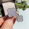 Anillos de diseñador para mujer Anillos de moda con diamantes llenos de diamantes Anillo de bodas de doble flor Joyas