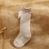 Nouveau-né bébé filles bas nœud papillon décoration doux mince genou-longueur chaussette enfants coton côtelé volants mi-long chaussettes