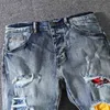 Designer skjortor amirrs jeans t 2023 jean tvätthål färgglad tiggare stil mäns små ben byxor motor dqd8