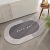 Morbido tappetino in fango di diatomea Toilette per la casa Porta del bagno Assorbimento d'acqua Cucina a piedi ad asciugatura rapida