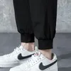 Pantaloni da uomo Pantaloni da jogging da uomo ad asciugatura rapida da uomo sottili 2022 estate leggeri tinta unita pantaloni streetwear giapponesi casual neri da uomo