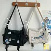 Kvinnor axel messenger väska kvinnlig nylon mångsidig postman student stil hög kapacitet verktyg paket 220627