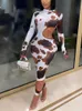 Casual Dresses OMSJ Irregular Hollow Out Bodycon Cow Print Women Long Sleeve Maxi Dress 2022 Sexy O Neck High Waist Simple Party Street Clot