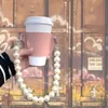 Hızlı gemi zarif taşınabilir kahve fincan tutucu yeniden kullanılabilir içecek hediyesi beyaz inci dekoratif kolu pu deri bardak kılıf