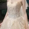 2022 Modest A Line Bröllopsklänningar Sheer Bateau Nec Lace Appliques Back Lace Up Country Style Chic Bridal Gown Custom Made