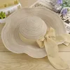 Chapeaux à large bord chapeau de paille femmes Style coréen été Protection solaire coton et lin arc grande plage pliable FashionWide