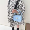 New Candy Color Mini Saco Infantil Fashion Fashion Korean portátil Smitle Square Style estrangeiro Mensageiro de ombro simples insere