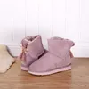 أزياء الكاحل Bowknot Snow Boots Women Wool Wool Fur مبطن أستراليا كلاسيكية جلدية حقيقية شتاء أحذية دافئة دافئة