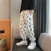 Pantaloni da jogging a vita alta Pantaloni da uomo stampati larghi Pantaloni sportivi da uomo Harem coreano Casual a gamba larga Streetwear lungo 220325