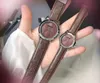 패션 남성 여성 꿀벌 시계 39mm 32mm 아이스 아웃 진정한 가죽 시계 테이블 쿼츠 운동 비즈니스 스위스 커플 손목 시계 Montre de Luxe