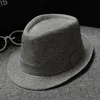 Jazz Hat panamski top kapelusze bawełniana pościel brytyjska czapka przeciwsłoneczna dla kobiet mężczyzn lato Trilby czapki Fedora Panama Beach Street Cap skąpe rondo dekoracyjne 39 kolorów B7939