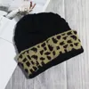 Chapeau de fête 25pcs lot léopard chapeaux de bonnet d'oreille en hiver tricot au réchauffeur de tricot ga entrepôt de Noël chapeau cadeau domil1138