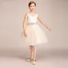 Vestidos de menina Flor de champanhe para casamentos pescoço puro Veja através de apliques faixa curta meninas de concurso de vestido de vestido de aniversário