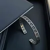 2023 Designer New Fashion jewelry S925 antique interlocking carved hollowed out old square wide narrow version couple bracelet for men and women