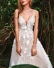 Sexy A-line Wedding Dresses Deep V Neck Long Lace Spaghetti Straps Sleeveless Chiffon Lace Ruffles Appliques Backless Sequins Floor Length Bohemian Wedding Gowns