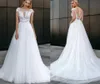 Cap Sleeves Tulle 2022 Wedding Dress A-Line O-Neck Beach Party Bridal Gown ILLUSION Button Lace Appliques Vestido De Noiva Robe Mariee