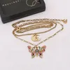 Designer Double Letter Pendant Necklaces Gold Plated Butterfly Crysatl Pearl Rhinestone Sweater Necklace for Women Wedding Party Jewerlry Accessories