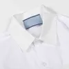 Kvinnors blusar Skjortor Designer Fashion Design Nytt par Classic Triangle Pocket Stitching Casual Long Sleeve Shirt Coat f￶r m￤n och kvinnor 0D7D