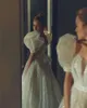 Abiti da sposa a-line carini pizzo tulle maniche a sbuffo bateau senza spalline applicazioni senza schienale paillettes perline plus size volant abiti da sposa abito da treno su misura