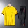 Designer TrackSuits T Shirt and Shorts 2 -częściowe zestawy męskie damskie wypoczynek streetwear moda biała czarna haft haftowane krótkie rękawy T197W