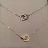 Women Double Ring Ciplant Necklace Collane Love Designer Collane Full Diamonds Gioielli in acciaio in acciaio Clavicle Chain Lovers Gift227C