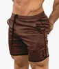 Nouveaux shorts pour hommes camouflage couleur respirant fitness muscle shorts de sport running pantalons à séchage rapide été serré loisirs taille M - 2XL